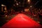 red carpet for celebrity awards ceremony, with view of the stage and audience visible in the background