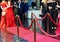 Red carpet entrance with stanchions and ropes