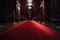 red carpet runner leading to red velvet curtain on stage, for musical performance or play