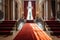 red carpet stretching through the grand foyer of an elegant mansion