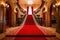 red carpet stretching through the grand foyer of an elegant mansion