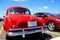 Red cars in parking lot