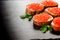 red caviar on black bread with butter. Healthy food. Fish appetizer. dark background