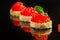 Red caviar canape or sandwich with red snack salmon fish, seafood. food background. top view