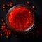 Red caviar, a jar with fresh appetizing, tasty caviar on a black background, top view, flatley,