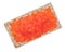 Red caviar over crispy flat bread isolated on white background.  Delisious food - salmon caviar top view. Flat lay