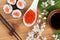 Red caviar, sushi set, sakura branch and chopsticks