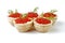 Red caviar in tartlet, isolated over white