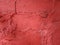 Red cement concrete wall surface for exterior and interior room floor paint or use as a color sample backdrop, abstract texture.