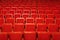 Red chairs for the audience in the cinema or theater
