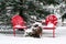 Red chairs in snow