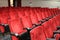 Red chairs of the theater audience