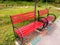 Red chairs to relax in the middle of the garden