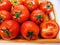 Red cherry tomatoes fruit vine tomato vegetable 
tamaatar tomat timatar pomidor tomate closeup view image photo