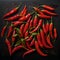 red chilies on a black board