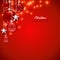 Red Christmas background with frosted and glossy Christmas balls, stars and sparks