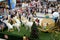 Red Christmas Ball above Styrofoam statue of white Unicorn horses pulling golden spherical carriage