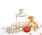 Red christmas ball, golden bag with gifts and old vintage lamp