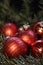 Red Christmas balls with golden lettering