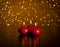 Red christmas candles on wood table golden bokeh background