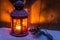 Red Christmas Lantern Covered in Snow Outdoor