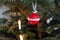 Red Christmas Ornament Hanging from the Tree, Peaceful Warm Lighting