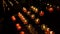 Red Church candles in darkness