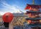 Red chureito pagoda with cherry blossom and Fujiyama mountain on the night