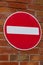 Red circular no entry sign on a brick wall Birkenhead Wirral August 2019