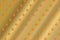 Red circular pattern over golden pathways - Digital background pattern