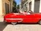 Red classic Cuban vintage car. American classic car on the road in Havana, Cuba.