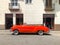 Red classic Cuban vintage car. American classic car on the road in Havana, Cuba.