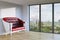 Red classic leather sofa in white walls interior room with urban
