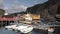 Red Classic Norwegian Rorbu fishing huts, Nusfjord on Lofoten islands.