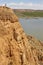 Red clay erosion gully and river. Eroded landscape. Spain