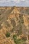 Red clay erosion gully and river. Eroded landscape. Spain