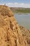 Red clay erosion gully and river. Eroded landscape. Spain