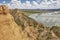 Red clay erosion gully and river. Eroded landscape. Spain