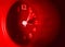 Red clock with speedy blurred effect