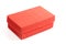 Red closed corrugated cardboard box isolated