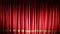 Red closed curtain with light spots in a theater or opera