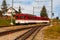 Red cogwheel train on Rigi Mountain, Swiss Alps