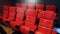 Red color leather movie theater cinema seat chairs.