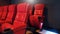 Red color leather movie theater cinema seat chairs.