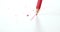 Red colored pencil with broken tip with notebook