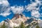 Red colors of Dolomites, Italy. Croda Rossa mountain with blue s