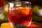 A red coloured negroni cocktaiL