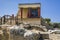 Red columns of the Knossos palace. Fragment of the ruins of the Knossos palace.