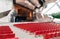 Red concert chairs in the Jay Pritzker Pavilion, located centrally in Millennium Park in Chicago.