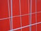 Red container with grey iron fences
